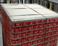 the-robertpack-debander-robot-for-steel-top-frames-with-plastic-straps-at-Coca Cola